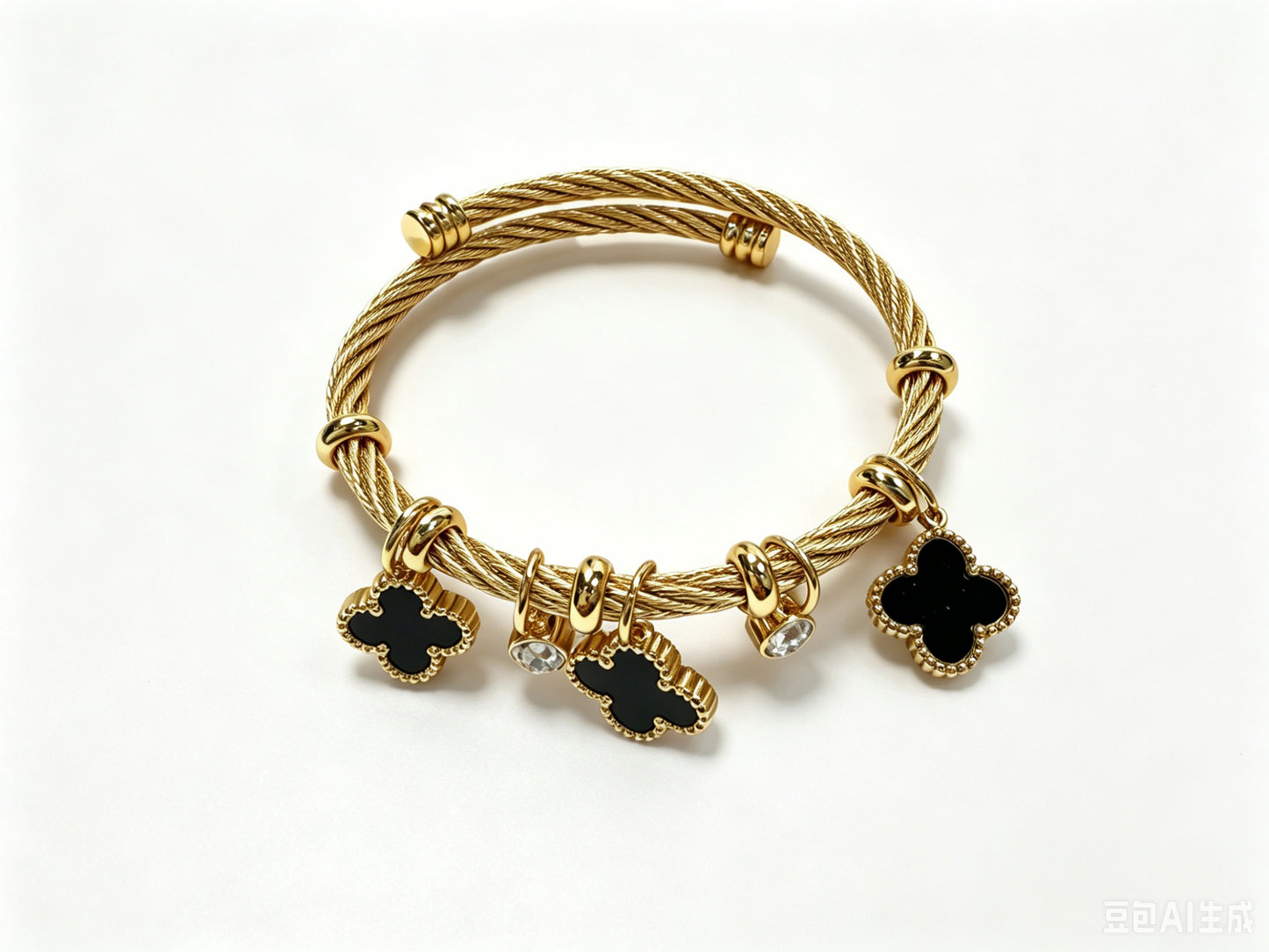 Gold-Tone Bracelet with Black Clover Charms