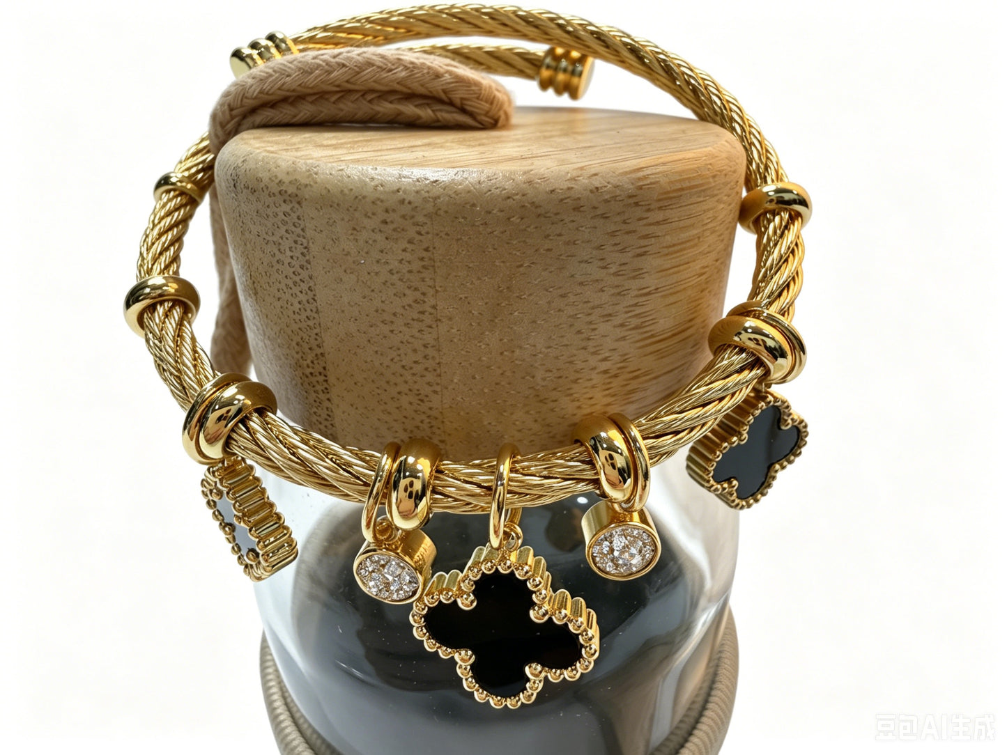 Gold-Tone Bracelet with Black Clover Charms