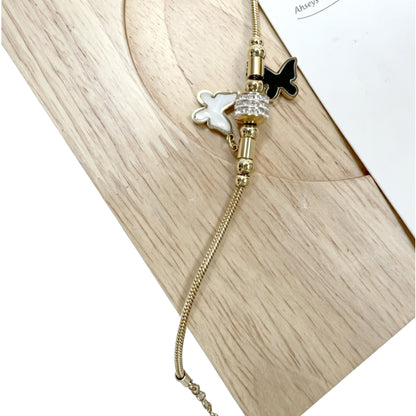 Gold-Tone Bracelet with Black & White Butterfly Charms