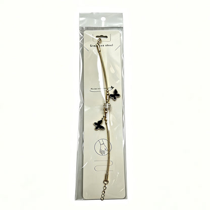 Gold Bracelet with Double Black Butterfly Charms