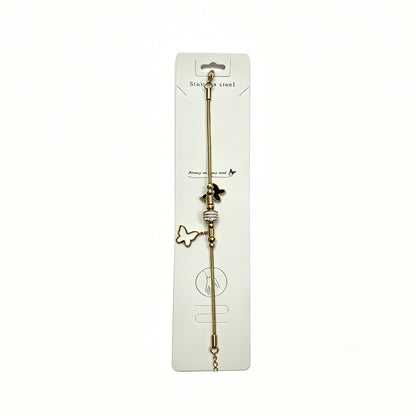 Gold-Tone Bracelet with Black & White Butterfly Charms