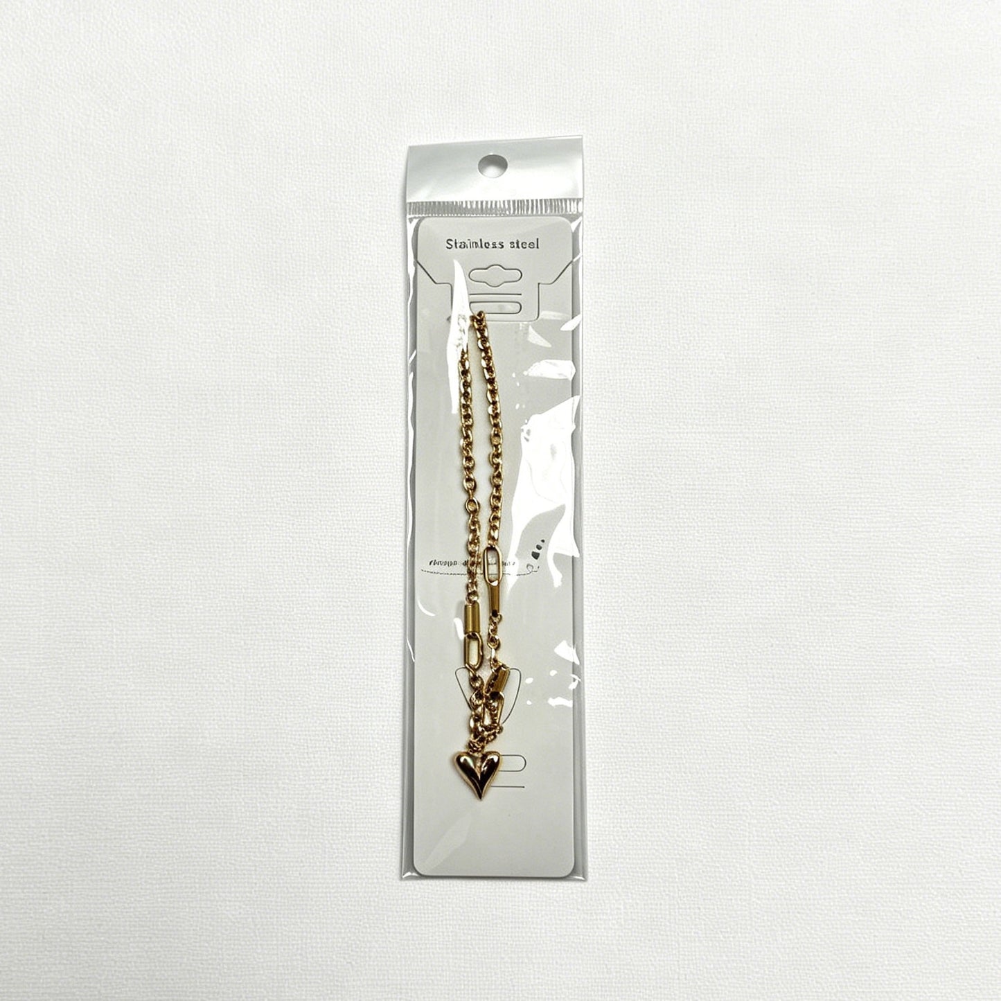 Gold-Tone Heart Pendant Necklace with Mixed Chain Links